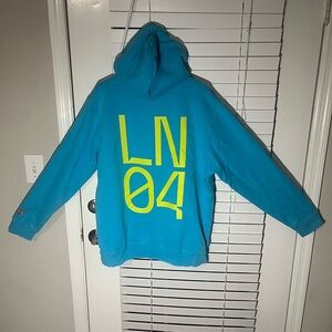 Lando Norris McLaren Formula One Team ‘22 Silverstone Blue and Yellow LE Hoodie